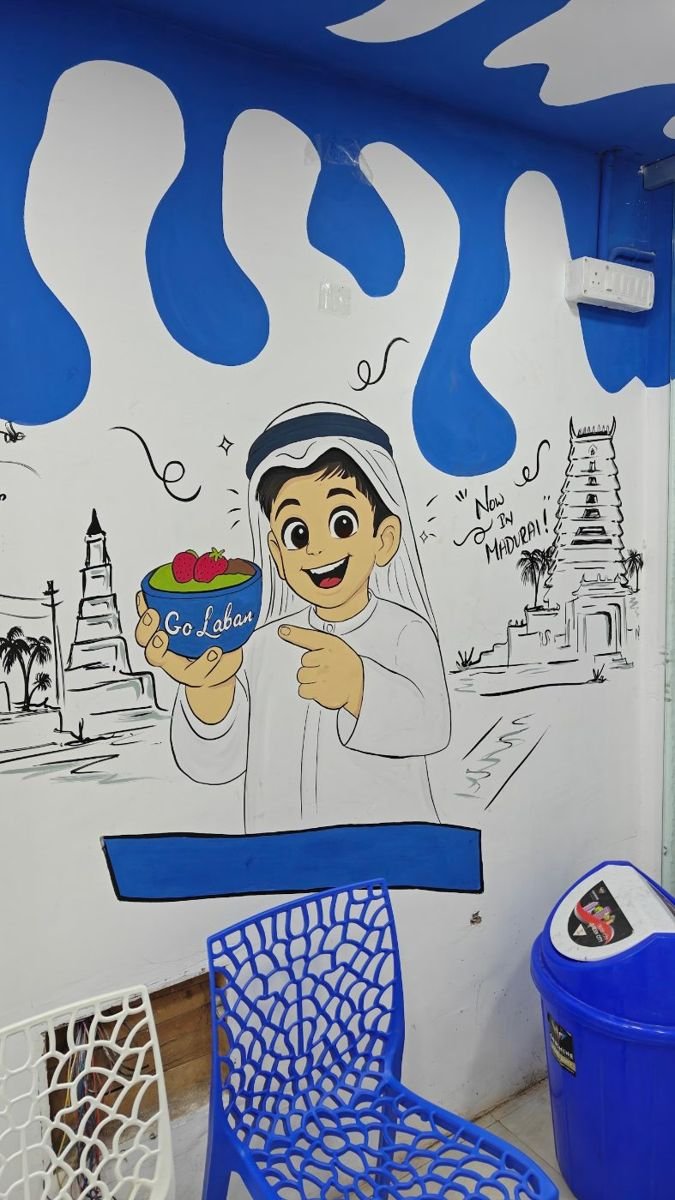 Mural of a guest with a laban bowl