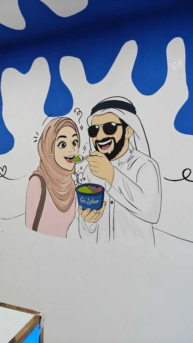 Mural of a couple sharing dessert
